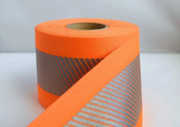 Fluorescent Orange FR Narrow-Width Fabric with 2″ 3M™ Scotchlite™ Reflective Material 5535 Silver Segmented FR Transfer Film